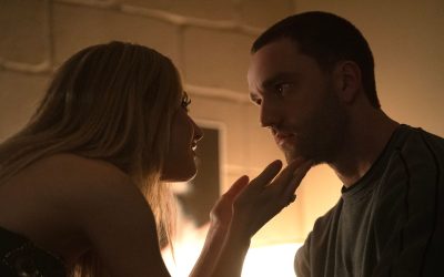 Lucy holds Stephen's chin in her hands in Tell Me Lies season 3