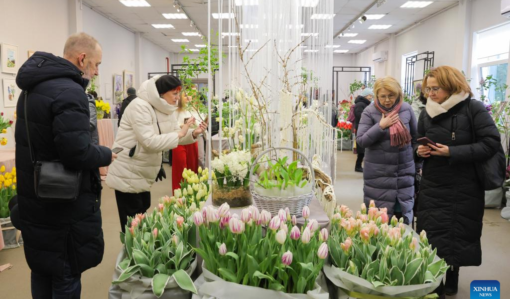 People visit flower show to celebrate upcoming International Women's Day in St. Petersburg, Russia-Xinhua