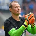 Alex Manninger claps his hands